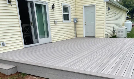 A residential gray synthetic wood deck in Strafford, PA