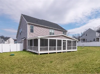 A modern deck enclosure that keeps bugs out in Wayne, PA