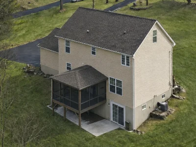 Amish-built screened-in deck in a suburban home in West Chester, PA